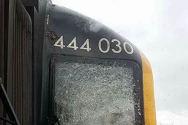 The smashed window on a Portsmouth Harbour to London train