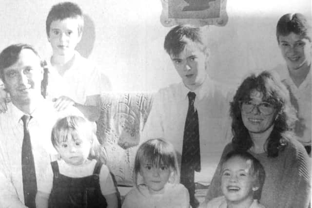 Terry Burgess and his wife Maureen with four of their own five children and the two boys with Down's Syndrome they adopted. Left to right, back, Joseph, eight, Andrew, 16, Leigh, 14. Front, Christopher, two, Abigail, four, and Charlie, six