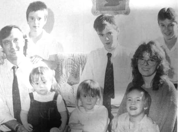 Terry Burgess and his wife Maureen with four of their own five children and the two boys with Down's Syndrome they adopted. Left to right, back, Joseph, eight, Andrew, 16, Leigh, 14. Front, Christopher, two, Abigail, four, and Charlie, six