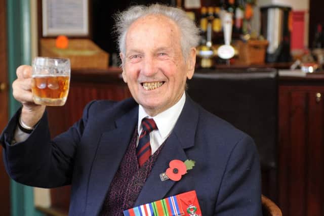 Bobby Tallack celebrates his 100th birthday with a half of ale