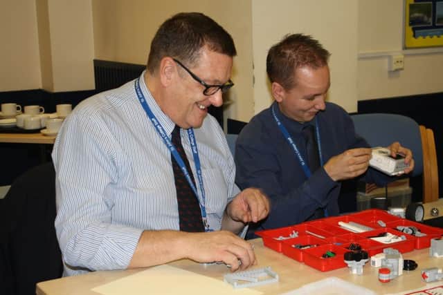 Tim Harris and Matt Bailey from St Johns College have fun building a Lego EV3 Mindstorm robot.