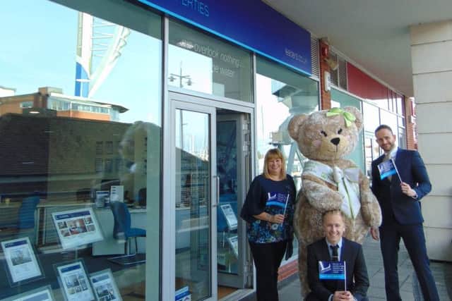 Betty the bear with the Portsmouth Leaders team, Vanessa Dixon, Edward Howells and Phil Bega