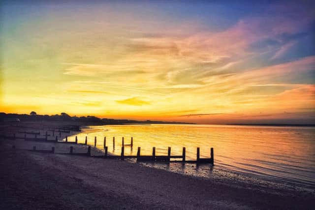 Waiting for the Sun: Hill Head at sunrise, by Simon Higgins
