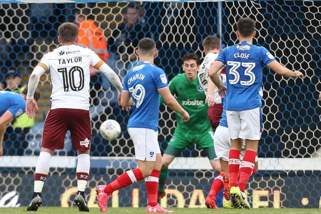 Matt Kilgallon's 80th-minute header broke the deadlock at Fratton Park Picture: Joe Pepler