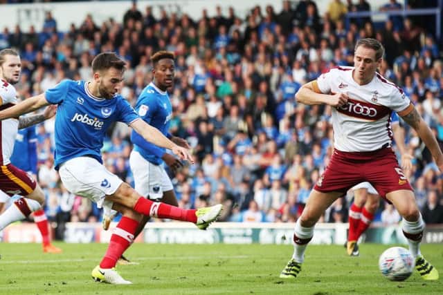 Ben Close sees his shot blocked by Matt Kilgallon at Fratton Park Picture: Joe Pepler