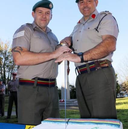 Sergeant Ray and DCGRM DCGRM Brigadier Haydn White ADC cutting the Corps birthday cake Picture: LPhot Sean Gascoigne