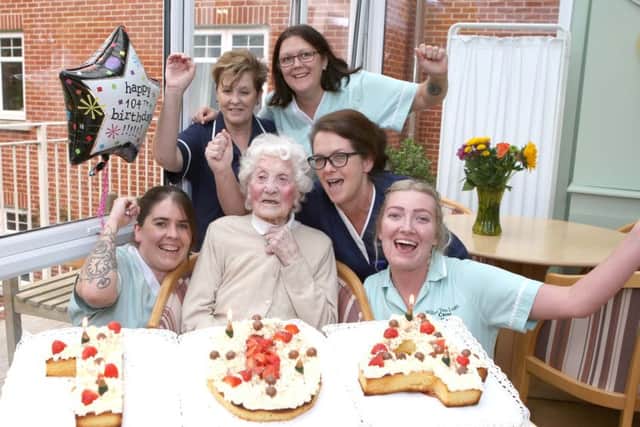 Mary celebrates with staff at Willow Tree Lodge. Picture: Habibur Rahman PPP-171017-183144001