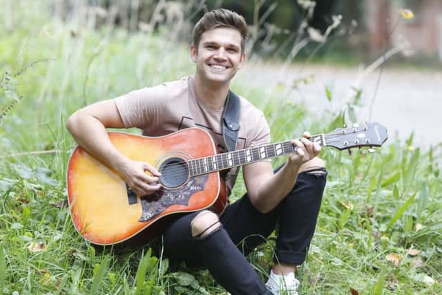 Unsigned artist Tom Bertram found himself alongside Miley Cyrus and Demi Lovato in the charts Picture: Habibur Rahman