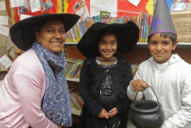 Left to right, Lucky Choudhury from Southsea with her daughter Maya Choudhury, eight, and friend Hasin Ahmed, seven.Picture: Ian Hargreaves (171242-1)