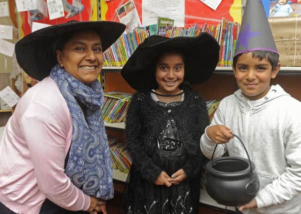 Left to right, Lucky Choudhury from Southsea with her daughter Maya Choudhury, eight, and friend Hasin Ahmed, seven.
Picture: Ian Hargreaves (171242-1)
