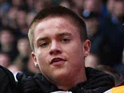 One of the men police want to identify after disorder at Pompey v Oldham
