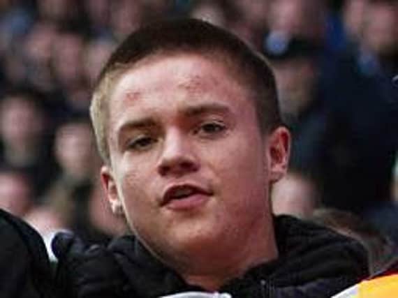 One of the men police want to identify after disorder at Pompey v Oldham