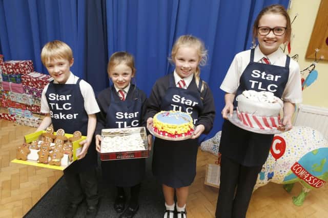 Star bakers with their showstopping creations - from left: Alex Priston, Lucy Simmonds, Olivia Wild and Bethany Smith     Picture: Habibur Rahman