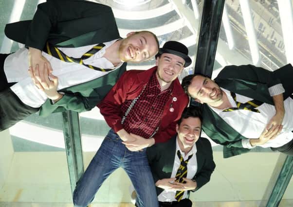 Cast members of Our House at  Spinnaker Tower, including George Sampson (in red jacket)
Picture:  Malcolm Wells
