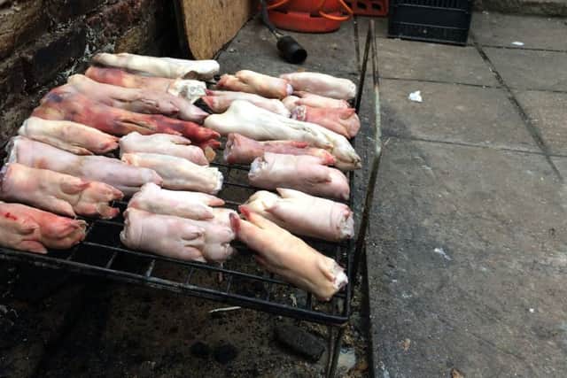 Pork trotters on a rusty rack in the yard at Best European Food & Drink, in Albert Road, Southsea, on December 19 last year