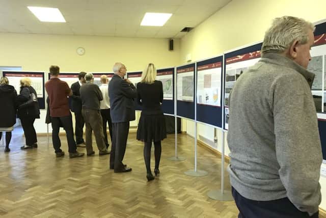 Residents gather at the Church of the Resurrection in Brecon Avenue, Portsmouth for the public exhibition