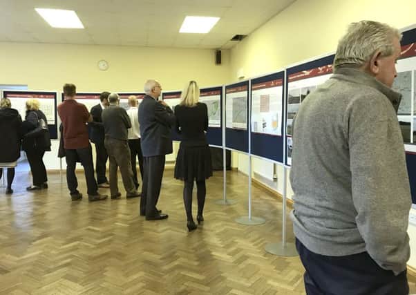 Residents gather at the Church of the Resurrection in Brecon Avenue, Portsmouth for the public exhibition