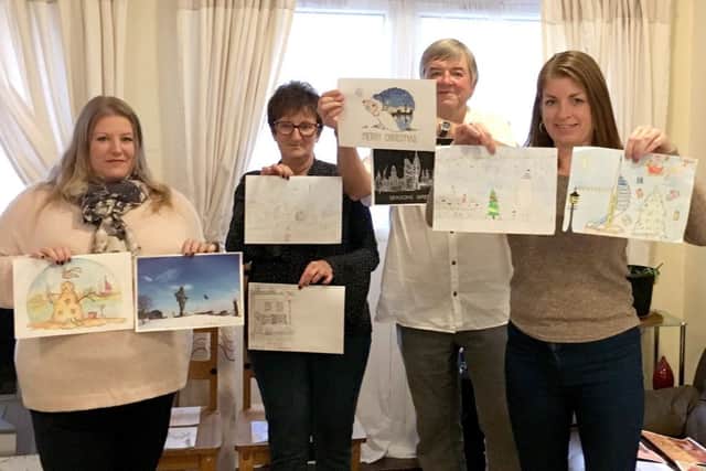jpns-02-11-17-020 dp christmas card competitionWinners chosen in Christmas card design competition for homeless charityWinning Christmas card design entries chosen. Judges from l-r: Cllr Donna Jones, Leader of Portsmouth City Council; Jan Tribe, Team Leader of SSJ supported housing property 1 Foster Road; Adrian Hillard, a Trustee of SSJ and Jo Buckley, resident of 1 Foster Road Winning Christmas card design entries chosen. Judges from l-r: Cllr Donna Jones, Leader of Portsmouth City Council; Jan Tribe, Team Leader of SSJ supported housing property 1 Foster Road; Adrian Hillard, a Trustee of SSJ and Jo Buckley, resident of 1 Foster RoadINFO BELOW:Eight winners have been selected to have their designs made into Christmas cards, which will be sold to raise money to provide more housing for homeless people.The Society of St James (SSJ), who provide support services for the homeless in Portsmouth, is running the initiative, with support from Portsmouth City Council. Eighty-three designs were received in