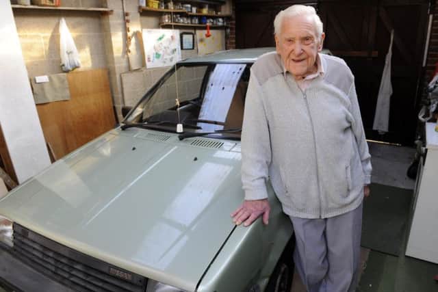 Reg Morris from North End, Portsmouth, Hampshire, still drives his Nissan saloon car to the shops Picture: Malcolm Wells