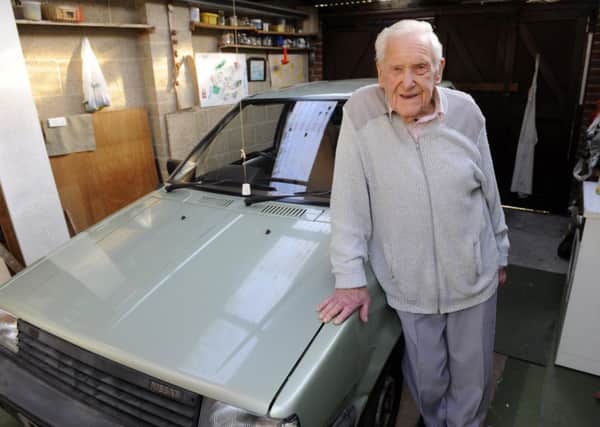 Reg Morris from North End, Portsmouth, Hampshire, still drives his Nissan saloon car to the shops    Picture:  Malcolm Wells
