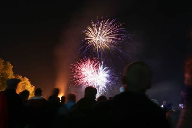 Crowds watch the fireworks