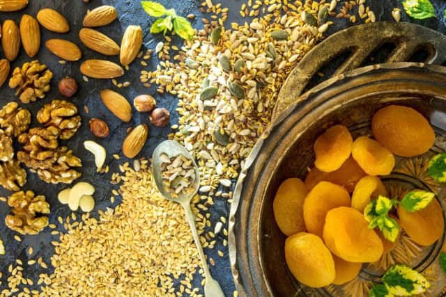 Studies have shown people who eat more nuts tend to have lower cholesterol and a lower risk of heart disease and some forms of cancer