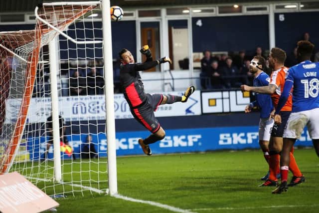 Luton keeper Marek Stech denies Matt Clarke Picture: Joe Pepler
