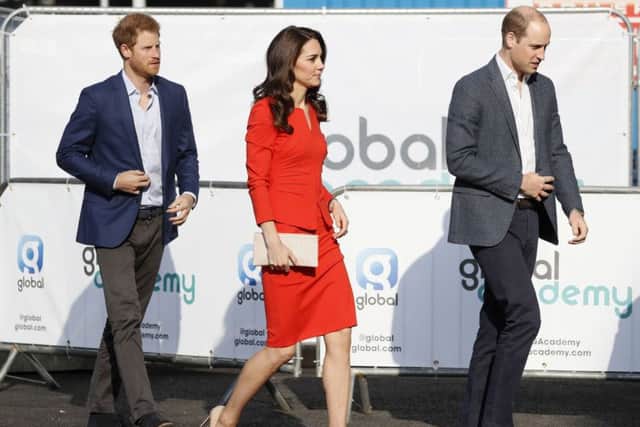 Prince Harry, the Duchess of Cambridge, and Prince William at a charity event for Heads Together, in London. Tom says the younger royals are an inspiration
(AP Photo/Kirsty Wigglesworth)