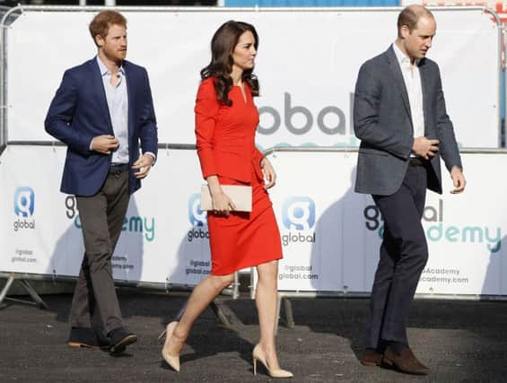 Prince Harry, the Duchess of Cambridge, and Prince William at a charity event for Heads Together, in London. Tom says the younger royals are an inspiration
(AP Photo/Kirsty Wigglesworth)