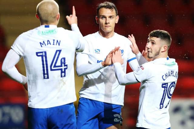Curtis Main celebrates his winner with Kal Naismith and Conor Chaplin