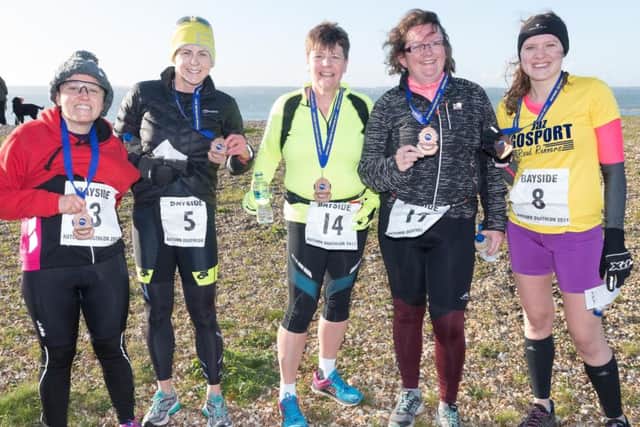 Bayside Duathlon. Kirsten Broadley, Louis Browne, Liz MacEnri, Donna Sims- Orman and Jasmin Curtin-Sewell with their medals. Picture: Keith Woodland