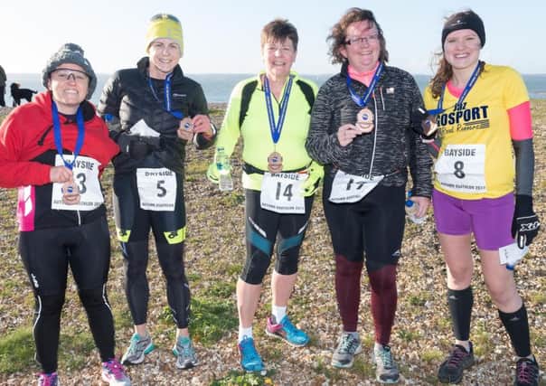Bayside Duathlon. Kirsten Broadley, Louis Browne, Liz MacEnri, Donna Sims- Orman and Jasmin Curtin-Sewell with their medals.  Picture: Keith Woodland