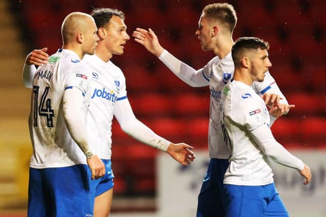 Pompey celebrate Curtis Main's goal against Charlton. Picture: Joe Pepler