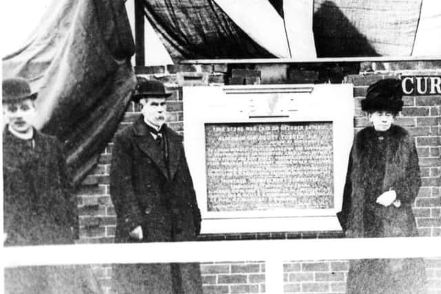 The unveiling of a plaque  in Curzon Howe Road marking the building of the first council houses in Portsea in 1912, the beginning of the slum clearance.