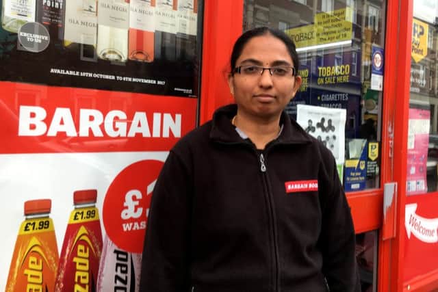 Kala Eswaran, 29, was working on her own in Bargain Booze, in Elm Grove, Southsea when two masked men armed with a knife burst in and tried to rob her