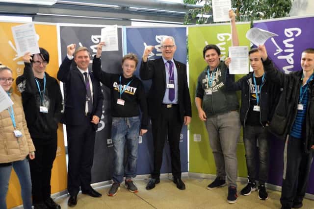 Staff and pupils at Fareham College celebrate