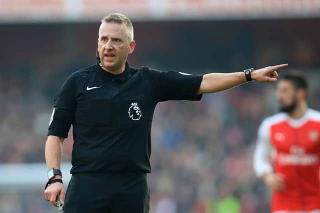Premier League ref John Moss