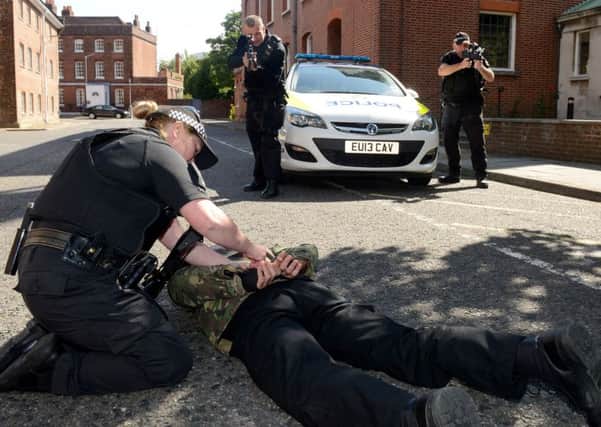 Armed police officers during an exercise at  Portsmouth Naval Base 
Photo: 

LA(PHOT) Keith Morgan