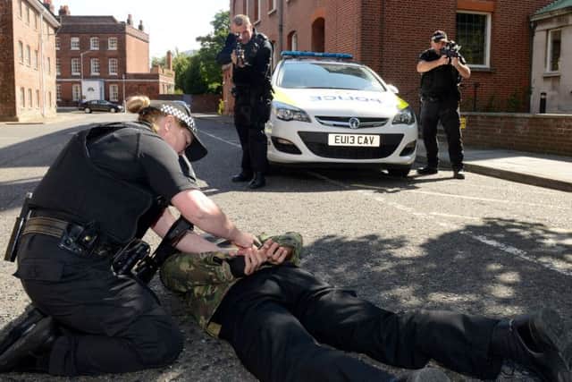 Armed police officers during an exercise at  Portsmouth Naval Base 
Photo: LA(PHOT) Keith Morgan
