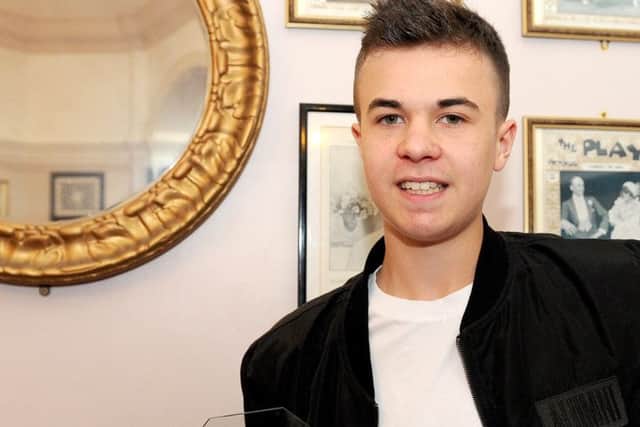 Lewis Hine pictured picking up his Hero of the Year Award at The News Youth Awards in 2016 Picture: Sarah Standing (160820-1757c) PPP-170623-124129001
