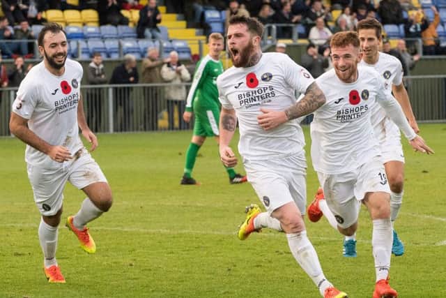 Ryan Woodford celebrates scoring during his 200th Hawks appearance.  Picture: Keith Woodland