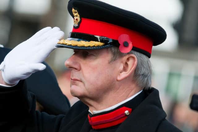 Commander Johnson (HMS Collingwood) Salutes the Last Post
(171211-190439006)