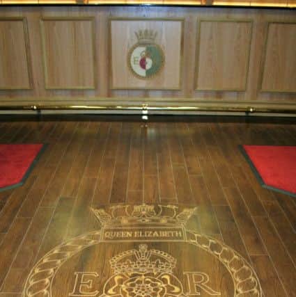 The ship's crest in the Wardroom