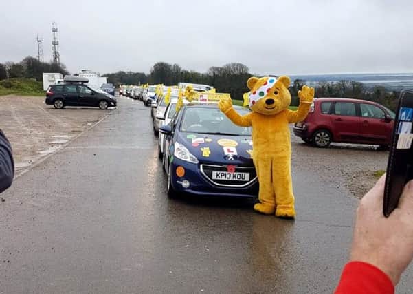 A convoy of driving instructors prepares to embark from Portsdown Hill on the Portsmouth leg of the Big Learner Relay, led by Nick Pink
Picture: Jane Holt