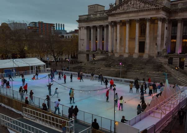 People enjoying the ice under the coloured lights Pictures: Vernon Nash