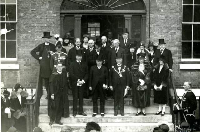 Opening of the new school by the home secretary in October 1927. The headmaster, Canon Barton, is on the lowest step, on the left. Dorothea Barton is possibly there, somewhere. (PGS Archive)