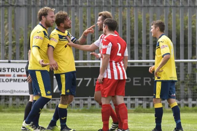Steve Hutchings during a heated exchange with Kempston players earlier this season. Picture: Neil Marshall (171026-36)