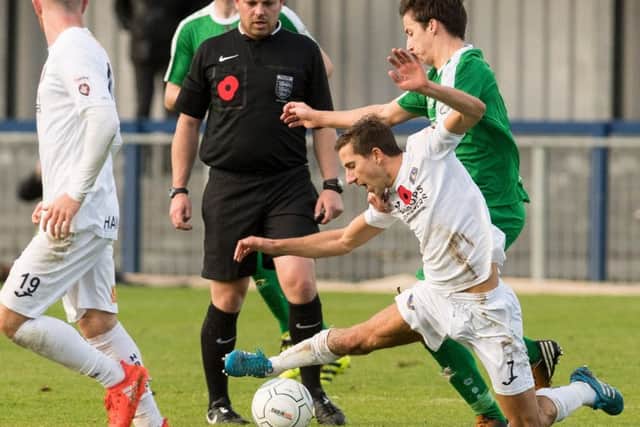 Wes Fogden is brought down against Hemel Hempstead. Picture: Keith Woodland