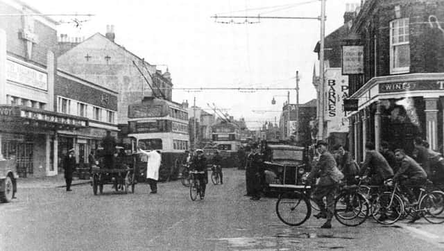 It would take  someone of the age of 55-plus to remember this scene along Commercial Road at the junction of Church Street.