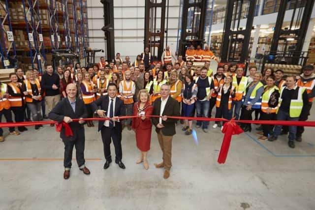 FatFaces chief executive Anthony Thompson, front left, Havant MP Alan Mak, Mayor of Havant, Councillor Elaine Shimbart, and infrastructure director Simon Ratcliffe, open the companys new distribution centre. Picture: Dan Wilson